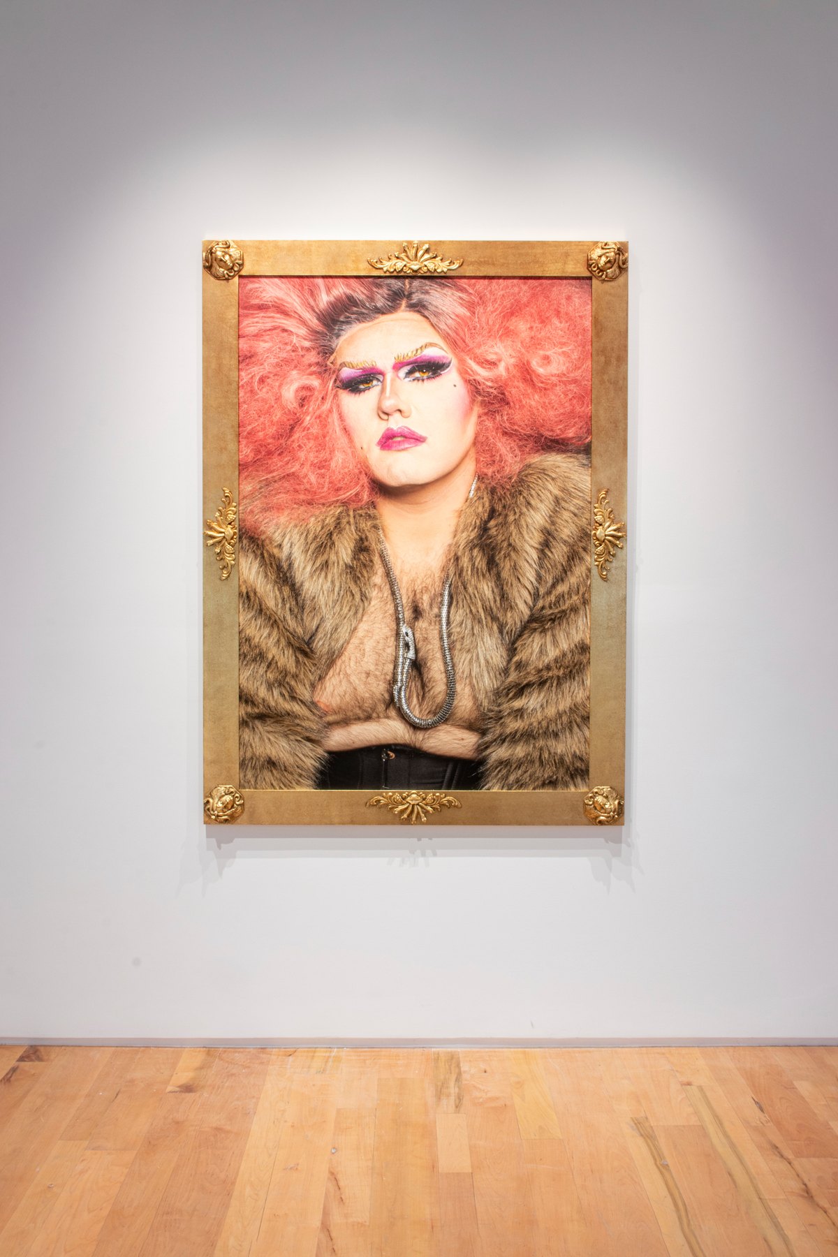 Best Lives portraits installed at Denny Dimin Gallery